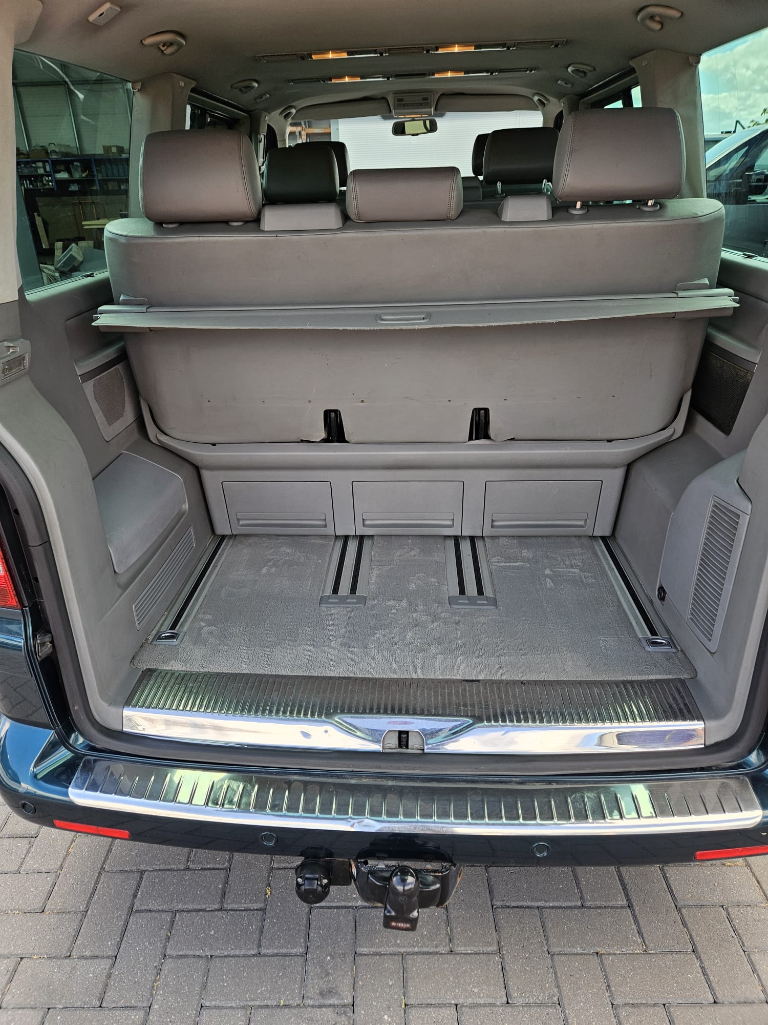 The same vehicle load space after carpet and trim cleaning
