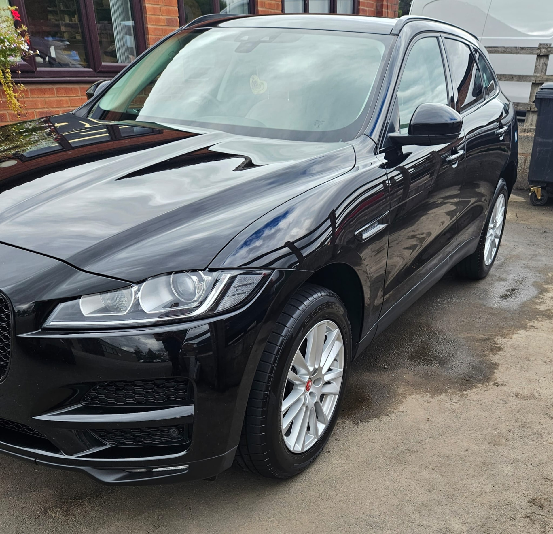 Glossy black Jaguar after paint correction by Jeynes Cleans