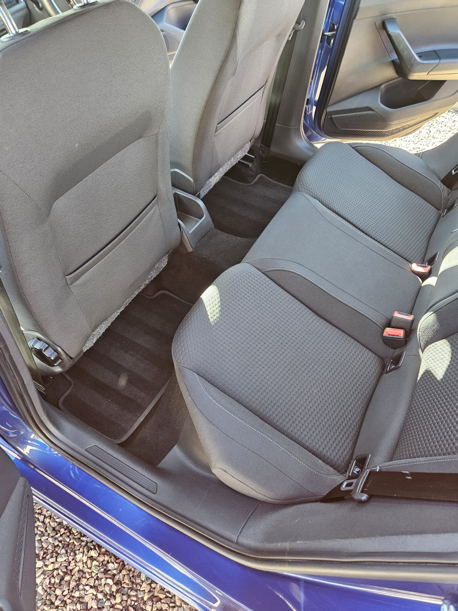 The same rear fabric seats after interior deep cleaning