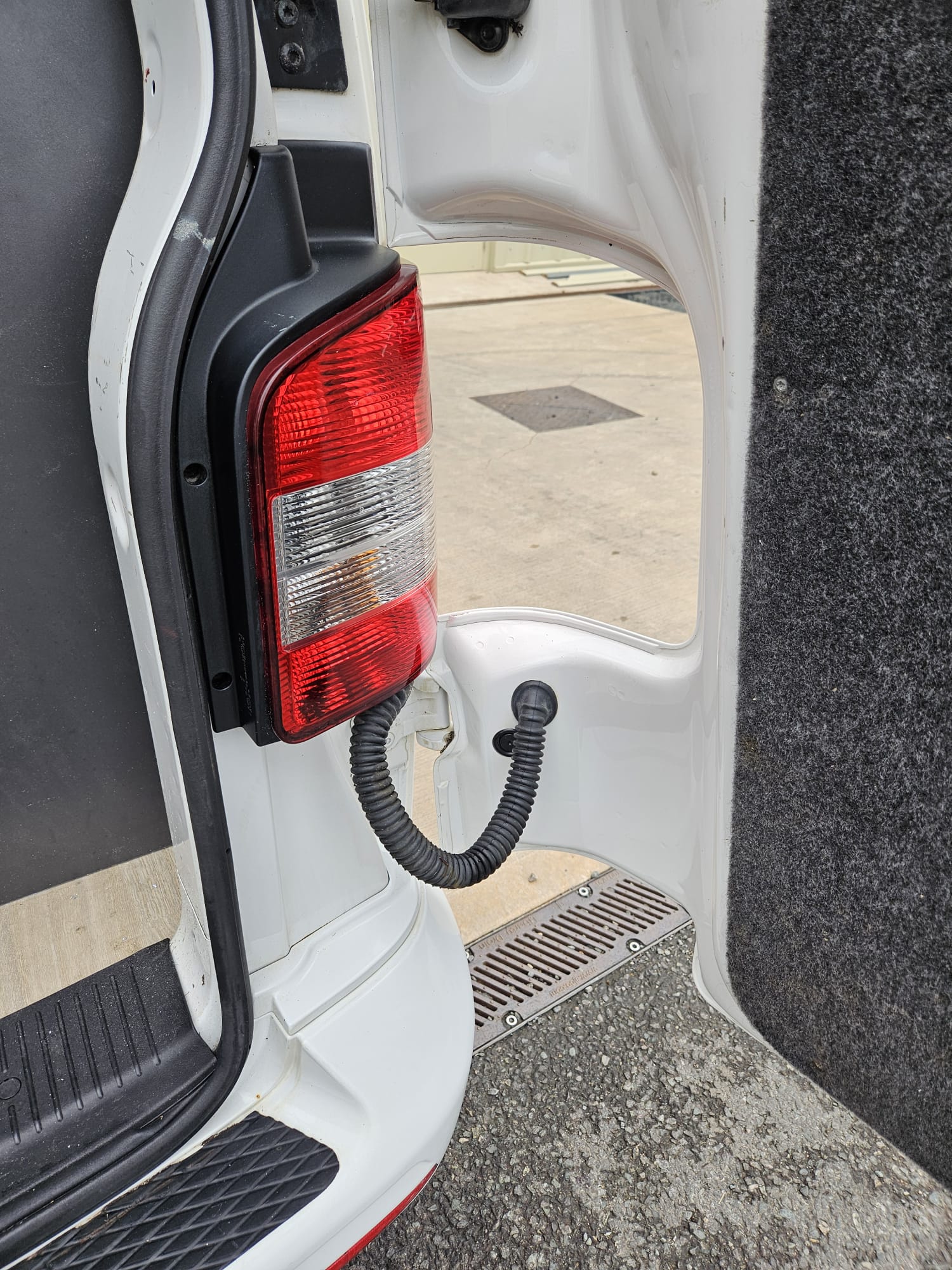 The same rear door shut and sill after detailed cleaning