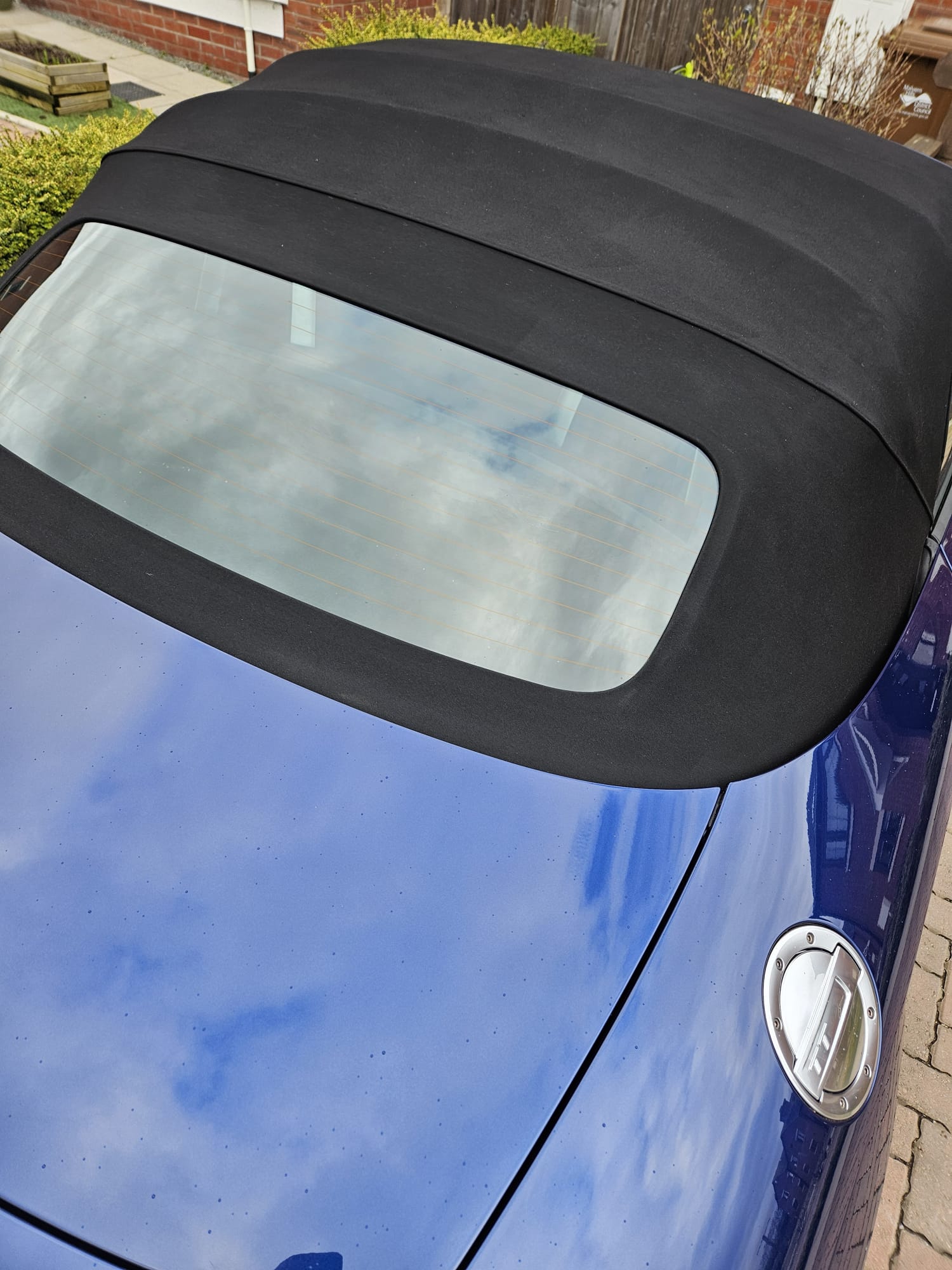 Freshly detailed convertible roof and rear glass