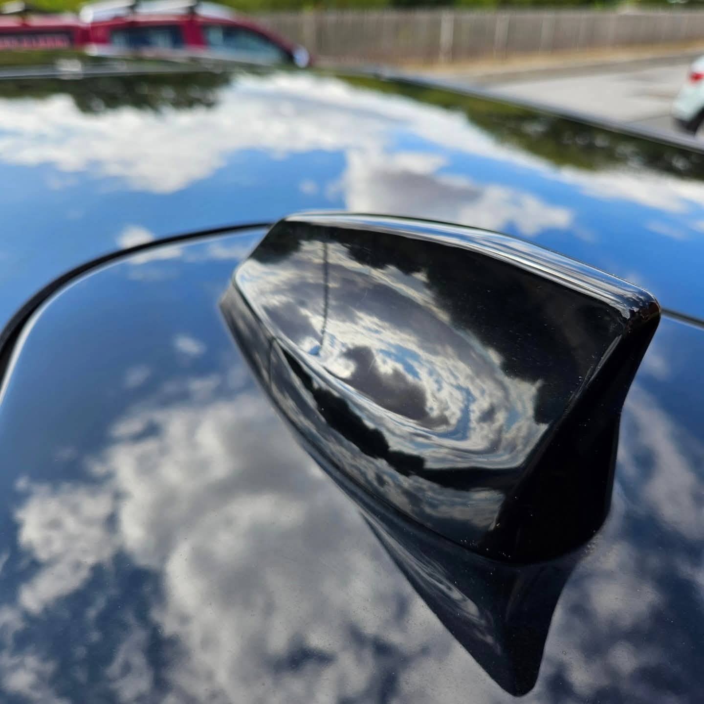 Deep gloss reflection on a freshly polished car roof